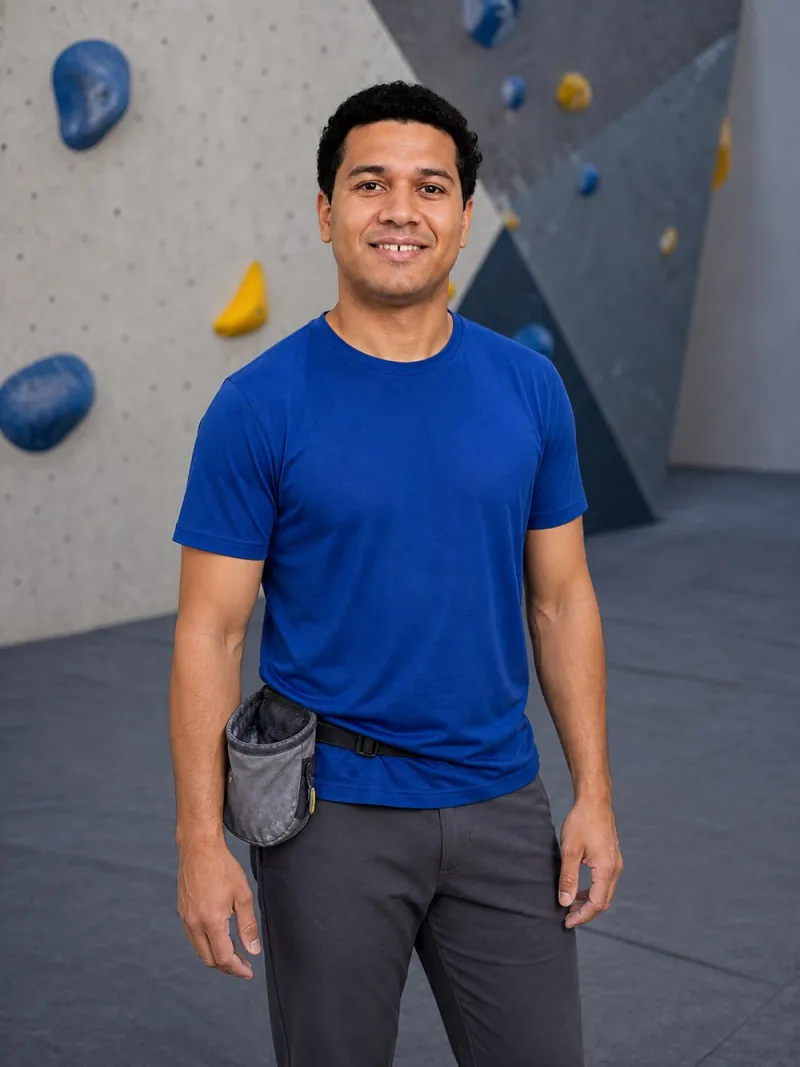 climbing photos for dating profile: Marcus, a fictional model, in the Between climbs scene